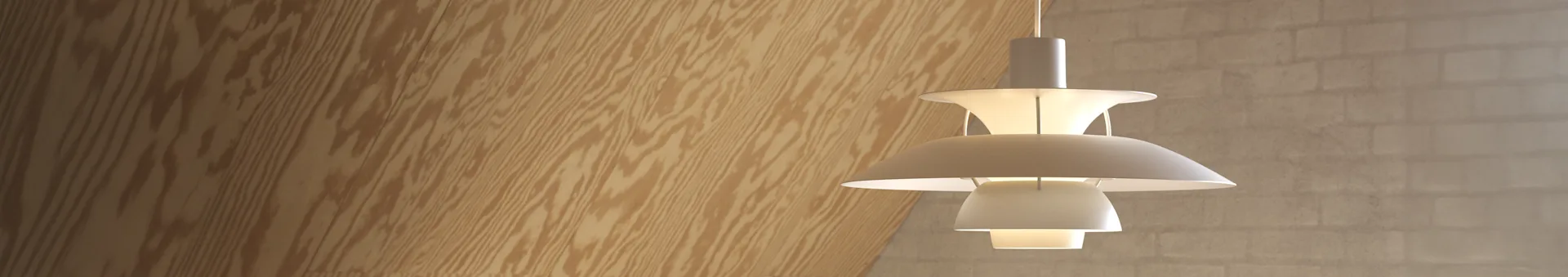 Gelaagde witte hanglamp tegen een lichte houten muur en een subtiele baksteenpatroonmuur.