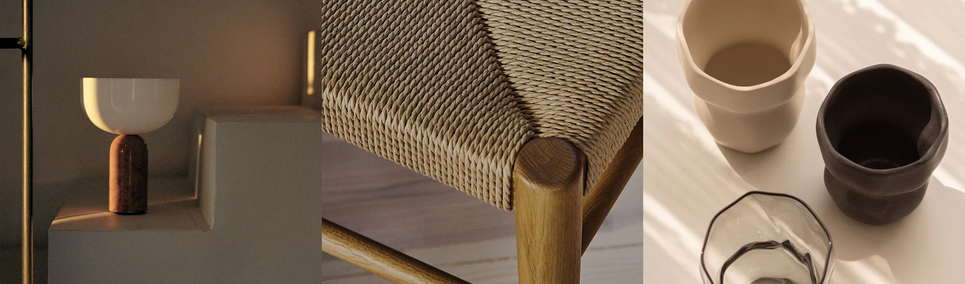 Een moderne lamp, een gevlochten stoelzitting en twee keramische mokken met een glazen kom, alles in warme tinten.