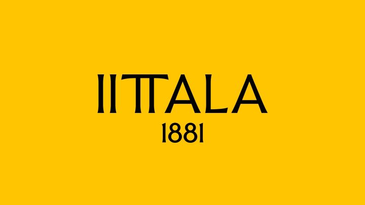 Iittala's nieuwe logo met gele achtergrond en naam met het jaartal 1881. 